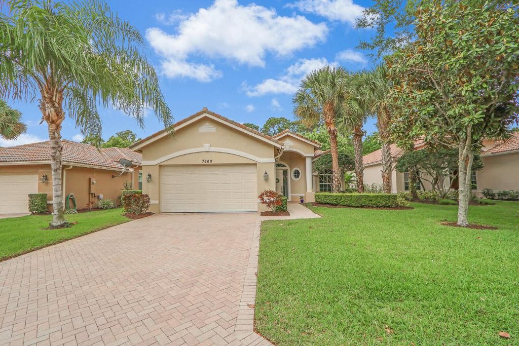 Photo of 7660 Greenbrier Circle, Port Saint Lucie, FL 34986 (MLS # R10973557)