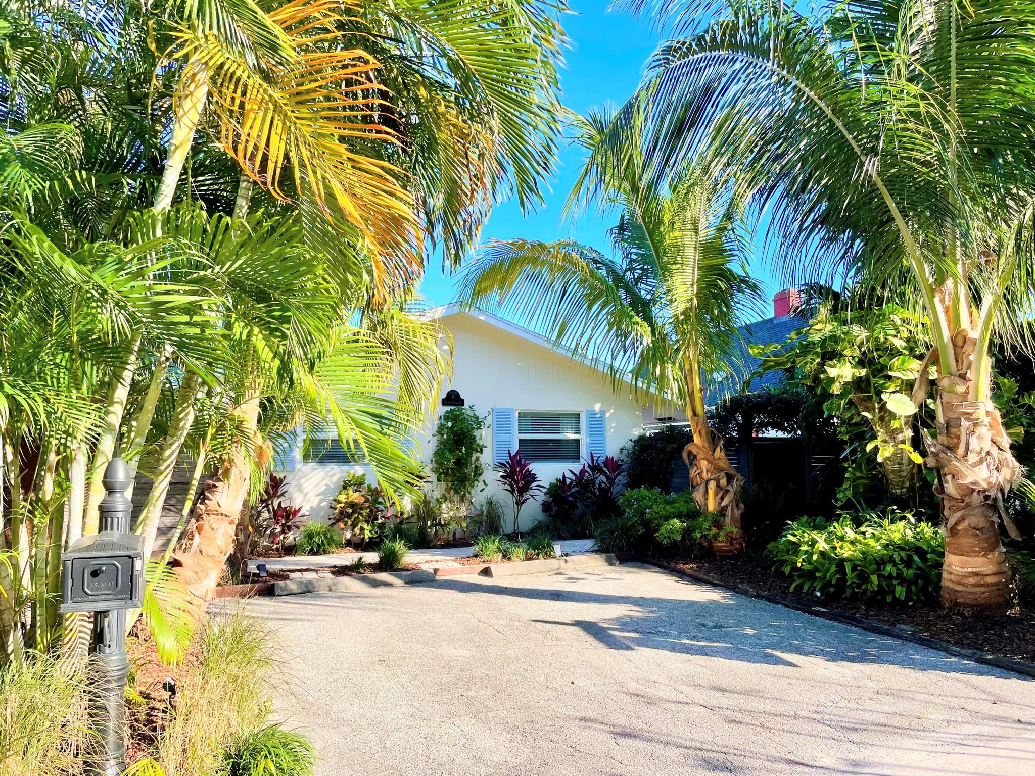 Low-interest Assumable Loan available... Welcome to 311 N. Swinton Avenue available in the heart of Downtown Delray Beach, just three blocks north of Atlantic Avenue in the historic neighborhood of Pineapple Grove. An exceptionally diverse property offering a coveted blend of versatility, prime location, and abundant potential, offering the best of both worlds. Relaxing and serene, yet within easy walking proximity to downtown with dining options, shopping, and entertainment. Options to use as a single-family residence, an income deriving investment, or more... Renovated and extremely private residence, enhanced with mature plantings, and room for a large pool, this is your tropical retreat in the heart of town. Inviting patio areas around the property provide peaceful areas that ex