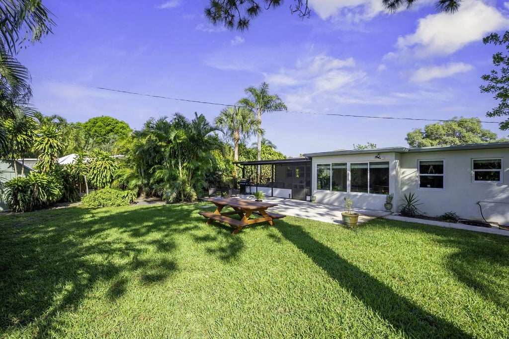 Photo of 837 W Jasmine Drive, West Palm Beach, FL 33403 (MLS # F10538995)