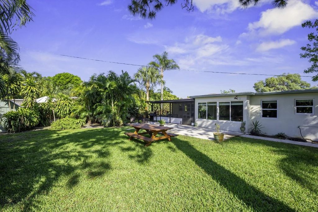 Photo of 837 W Jasmine Drive, West Palm Beach, FL 33403 (MLS # F10538995)