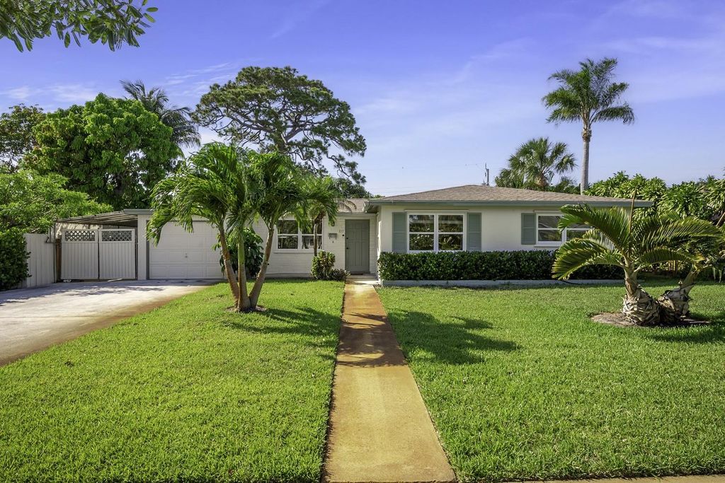 Photo of 837 W Jasmine Drive, West Palm Beach, FL 33403 (MLS # F10538995)