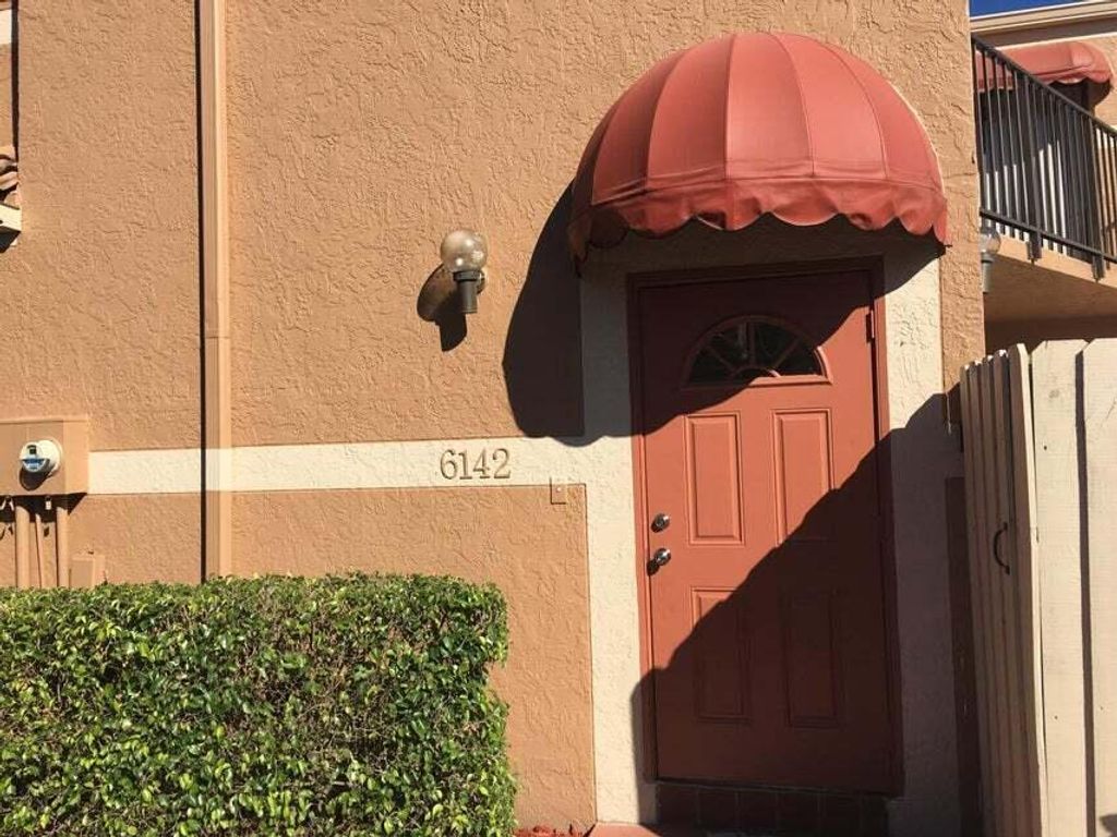 Photo of 6142 Seven Springs Boulevard, Greenacres, FL 33463 (MLS # R11110570)