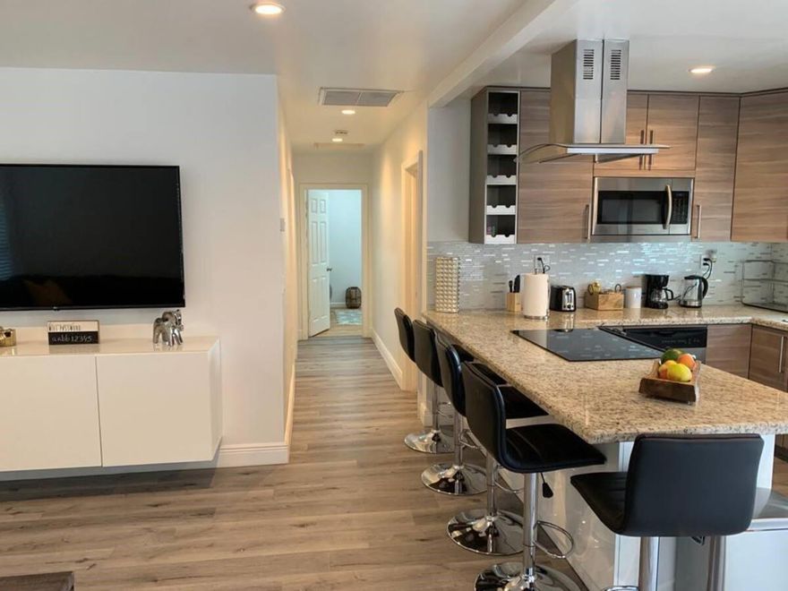 Beautiful Cozy, Completely renovated Lake House featuring 3 bedrooms, and an extra room perfect for an office.
2 full baths with Shower Panel Tower, an Amazing open kitchen with stainless steel appliances, and marble countertops. The open floor concept is perfect for gatherings! Large deck with a pool table and, outdoor sofa, a stunning lake view, ideal for fishing and kayaking. Impact windows, central a/c, 4  parking spaces. A few blocks from the Hard Rock Guitar Hotel and Casino, major highways. -Showing only weekends, 12-6 pm.
Please submit the prospect's ID, last 3 pay stubs, last 3 bank statements, and background and credit checks.