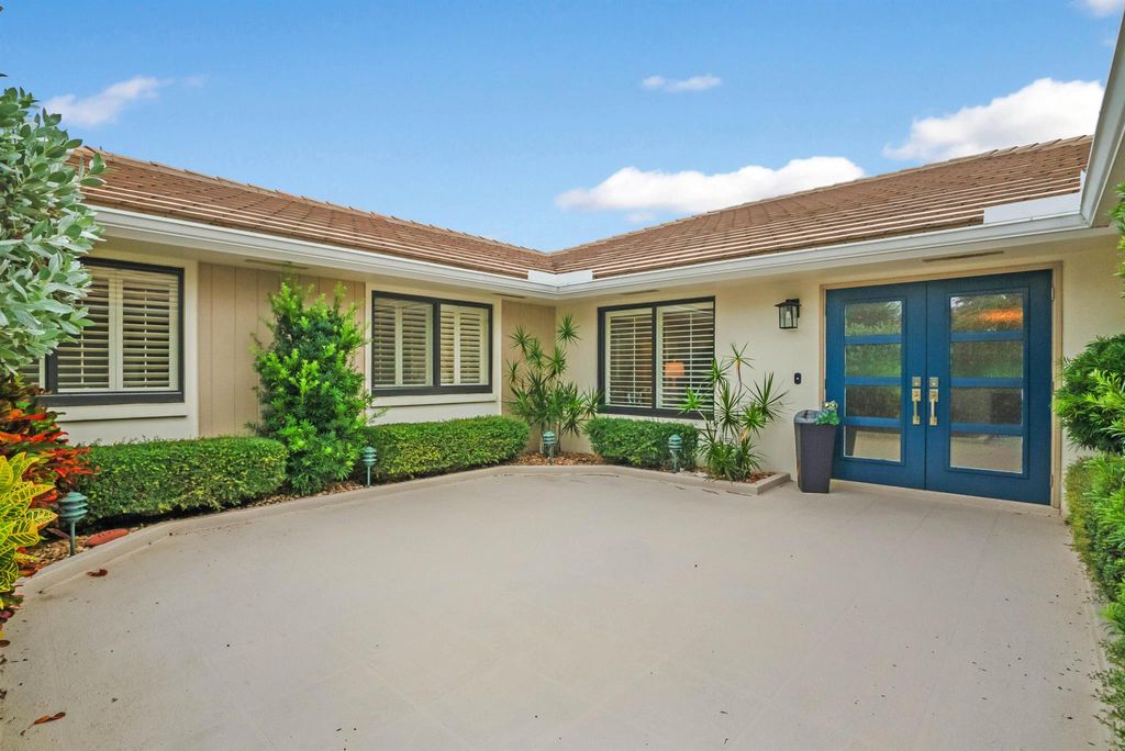 Photo of 1483 SW Troon Circle, Palm City, FL 34990 (MLS # R11022792)