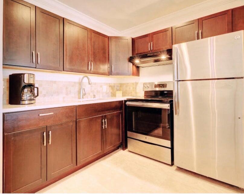 Photo of 134 Berkshire #F, West Palm Beach, FL 33417 (MLS # R11013885)