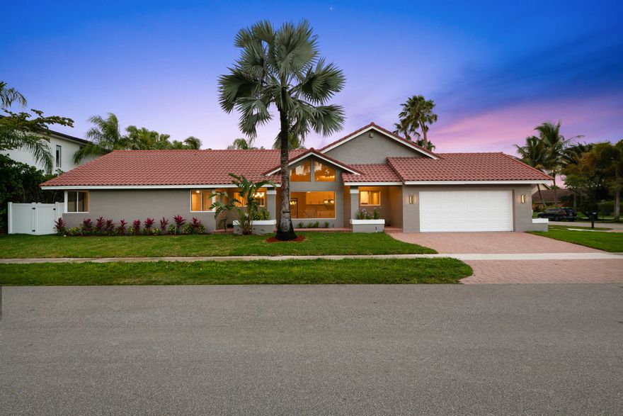 Wow! This 5 bedroom home (PLUS den/flex space/office) w/3.5 baths & a POOL showcase high-end finishes throughout! The stunning chef's kitchen features top of the line appliances, elegant white cabinetry & quartz countertops. All bathrooms have been tastefully updated w/today's most desirable designs. Fully redone laundry room cabinetry & new washer/dryer, new flooring & baseboards throughout, modern light fixtures/fans/lighting, fresh landscaping, & more!! This move in ready home offers a resort-style backyard perfect for relaxing & entertaining by the pool. With 2 driveways, there's ample parking for multiple cars! Located in highly sought-after Jacaranda Cay community, ideally situated across from Hawks Landing on a private cul-de-sac street.