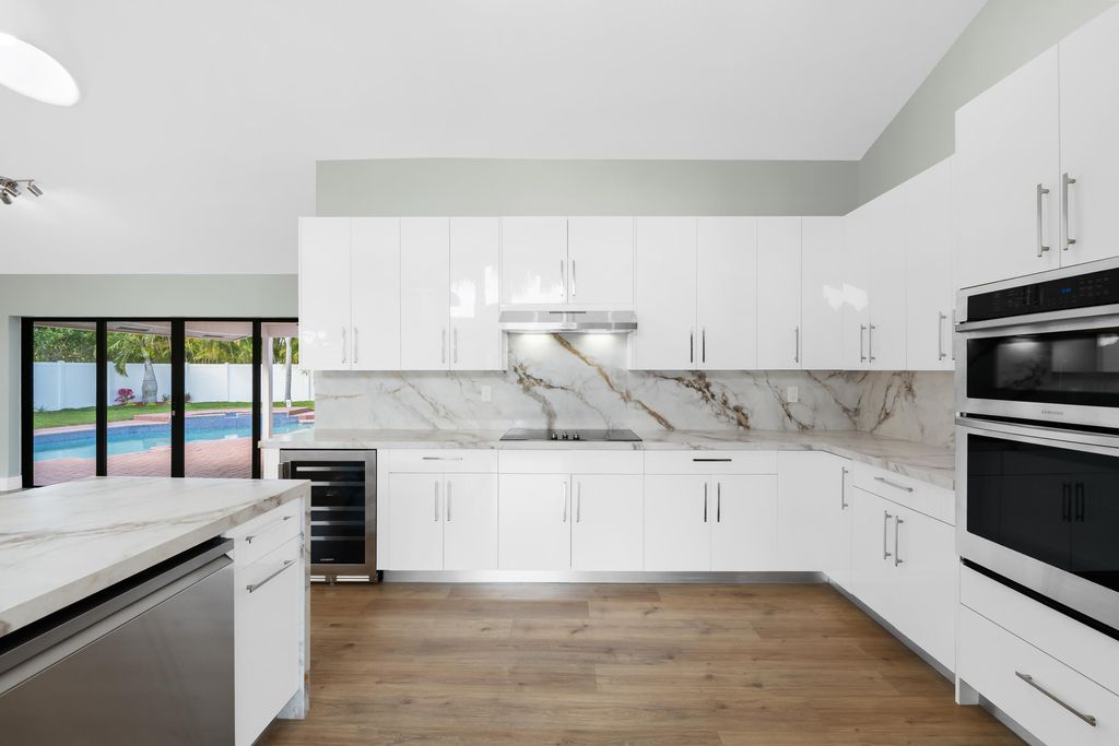 Photo of 10141 SW 3rd Street, Plantation, FL 33324 (MLS # B26012630)