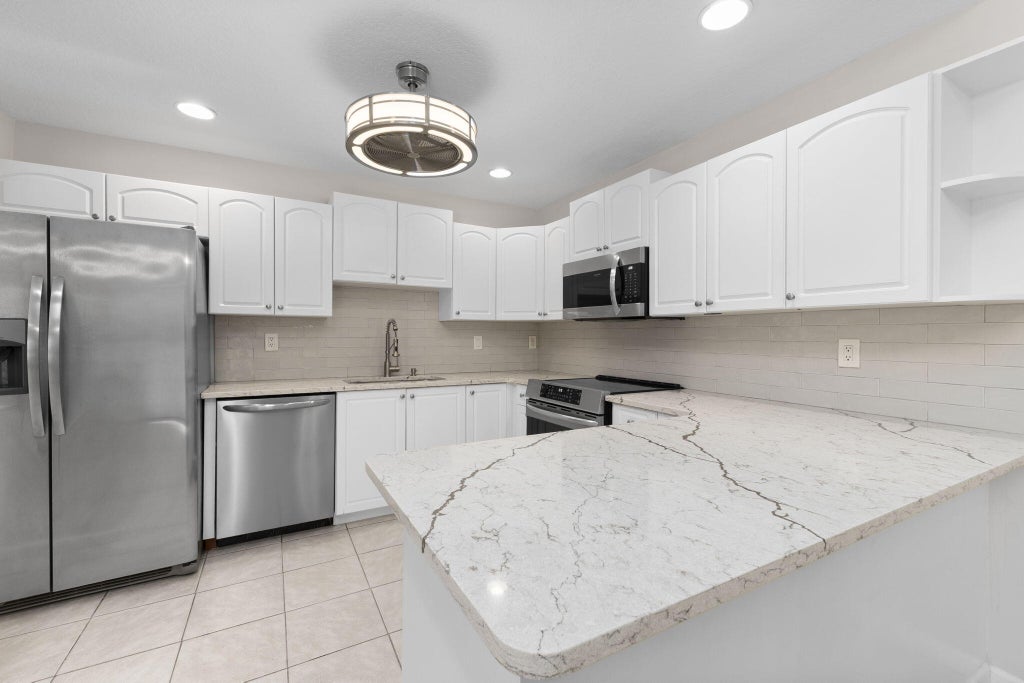 Photo of 1543 PHEASANT Walk #A, Fort Pierce, FL 34950 (MLS # B26060575)