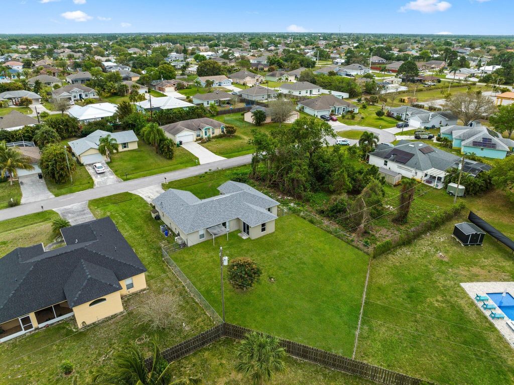 Photo of 4292 SW Elaine Court, Port Saint Lucie, FL 34953 (MLS # R10962915)