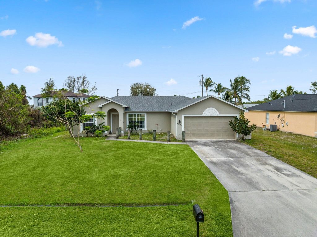Photo of 4292 SW Elaine Court, Port Saint Lucie, FL 34953 (MLS # R10962915)