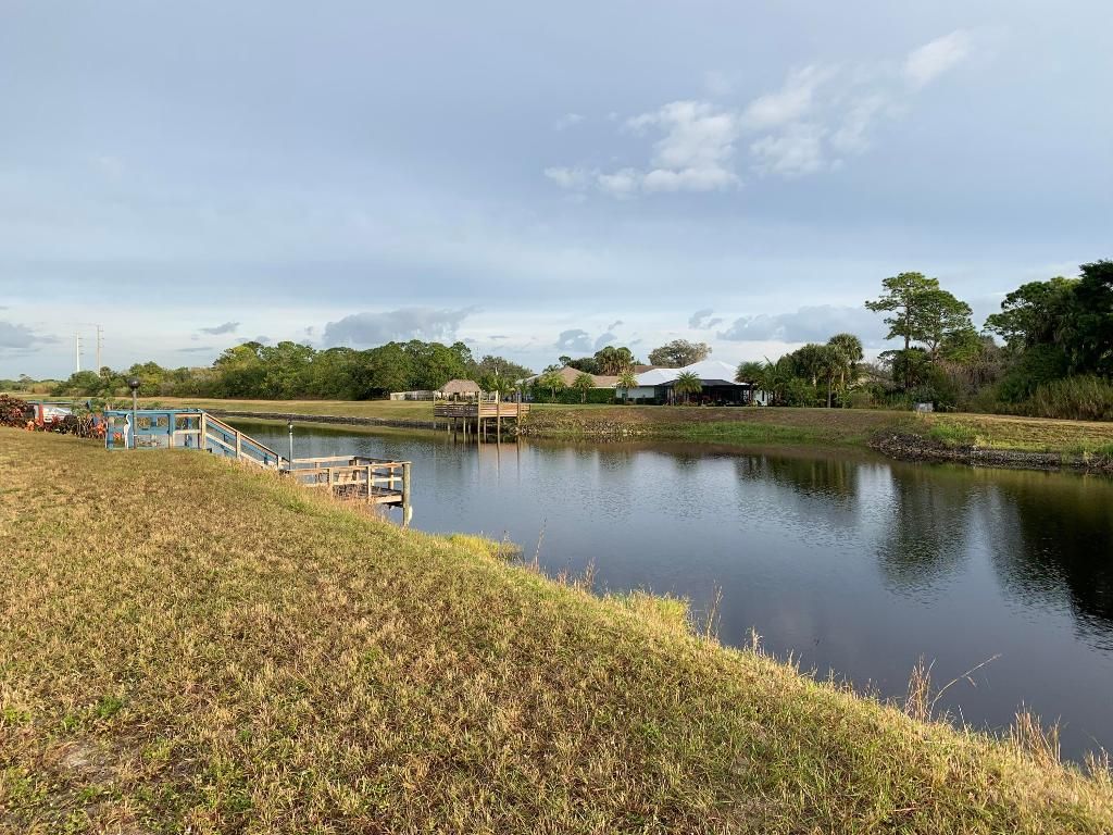 Photo of 2109 SW Import Drive, Port Saint Lucie, FL 34953 (MLS # R10948044)