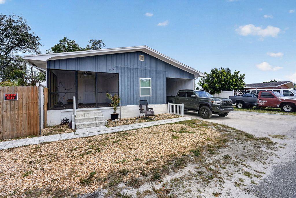 Photo of 7945 SE Fairchild Way, Hobe Sound, FL 33455 (MLS # B26023220)