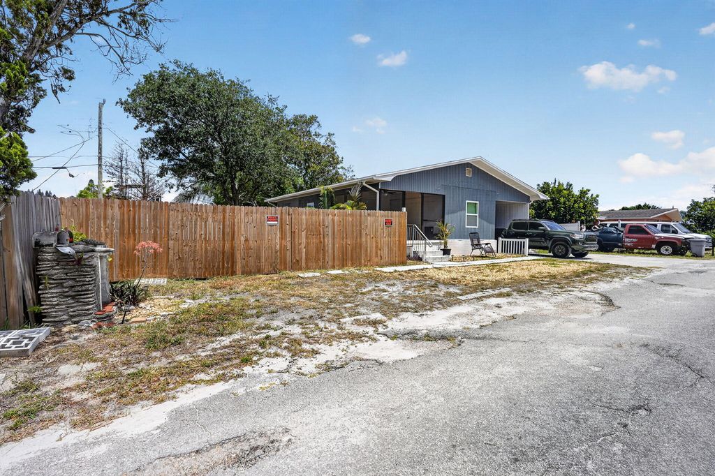 Photo of 7945 SE Fairchild Way, Hobe Sound, FL 33455 (MLS # B26023220)