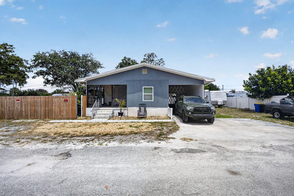 Photo of 7945 SE Fairchild Way, Hobe Sound, FL 33455 (MLS # B26023220)