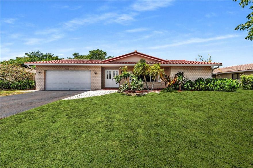 Price reduced for quick sale! Spacious 5 bed/ 2 bath single-family home in Coral Springs. Great cul-de-sac location with no HOA. Kitchen complete with granite counters, stainless steel appliances, and pass-thru to pool-patio. Split floor plan with separate living, dining, and family room—perfect for entertaining. Primary has spacious closet and en-suite bath. New carpet in living area and bedrooms. Freshly painted interior. Brand new roof for buyer peace of mind. Oversized screened and covered patio. Serene canal view. Fenced yard ideal for pets or play. Convenient 2-car garage and extended drive. Great central location near shops, schools, parks, and thoroughfares.