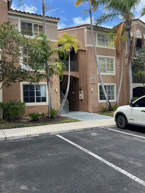 Renovated 2BR/2BA first floor condo with split floor plan. Kitchen features stainless steel appliances and granite countertops. Brand New Ceramic Tile Flooring throughout. Full-size washer and dryer in unit.
Gated community with secured entry, pool, tennis court, and fitness center. Conveniently located near major highways, shopping, dining, beaches and top-rated schools. Association requires 640 + credit score.