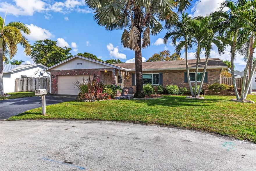 Welcome to this 3 bed, 2 bath pool home tucked away at the end of a quiet cul-de-sac in Palm Aire Village East. This location offers a peaceful, low-traffic setting perfect for relaxed living. The home is move-in ready with a 5-year-old roof and full impact windows and doors for energy efficiency and security. Inside, the updated kitchen features granite countertops, rich wood cabinetry and stainless steel appliances, highlighted by a charming dining area with exposed wood-beam ceilings. Outside, enjoy a large, fully fenced backyard with a sparkling pool and elegant travertine patio. Complete with a 2-car garage and a prime location near top golf courses and major highways, this home offers a fantastic South Florida lifestyle in one of Fort Lauderdale's most sought-after hidden gems!