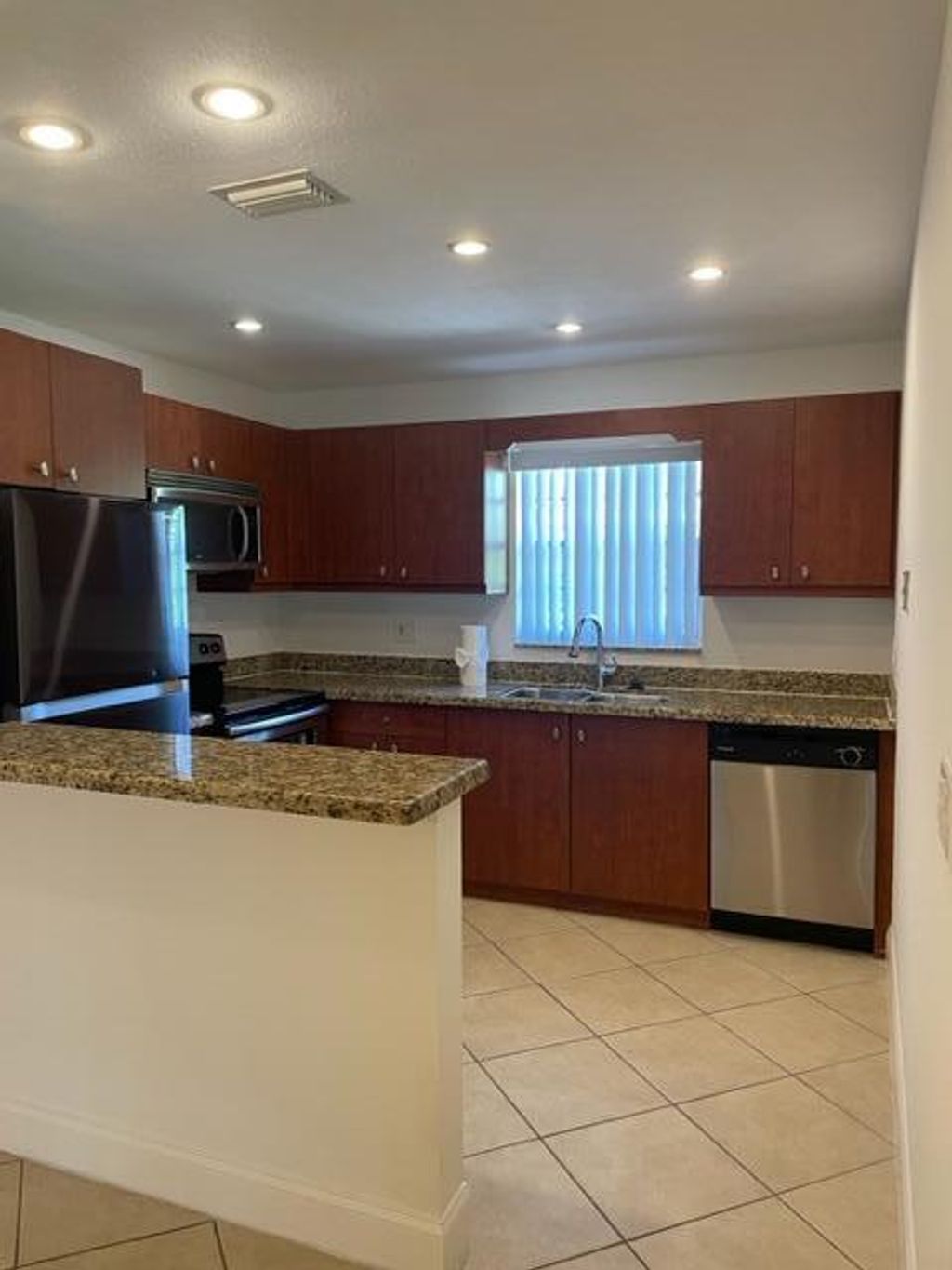 Photo of 1979 Juno Road, North Palm Beach, FL 33408 (MLS # B26018496)