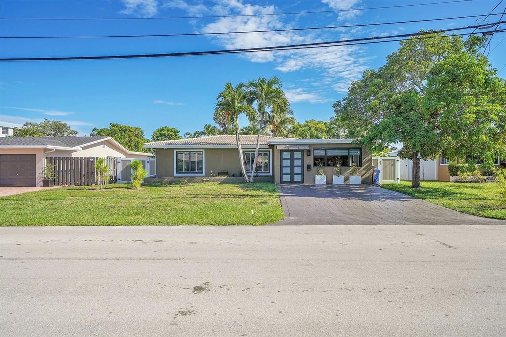 Photo of 1736 NW 38th Street, Oakland Park, FL 33309 (MLS # F10550106)