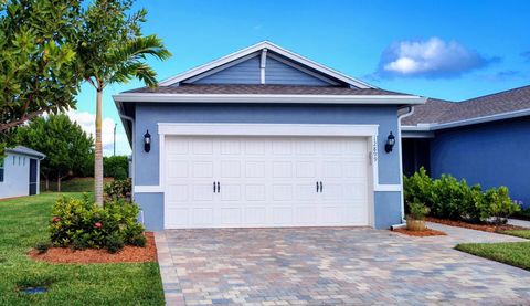 Photo of 12899 SW Gingerline Drive, St Lucie West, FL 34986 (MLS # R11143806)
