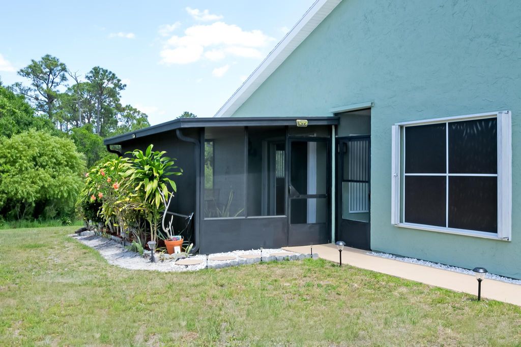 Photo of 1429 SE Larkwood Circle, Port Saint Lucie, FL 34952 (MLS # R11082466)