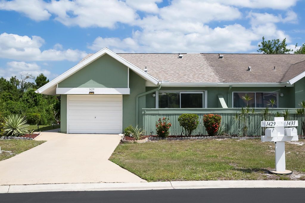 Photo of 1429 SE Larkwood Circle, Port Saint Lucie, FL 34952 (MLS # R11082466)