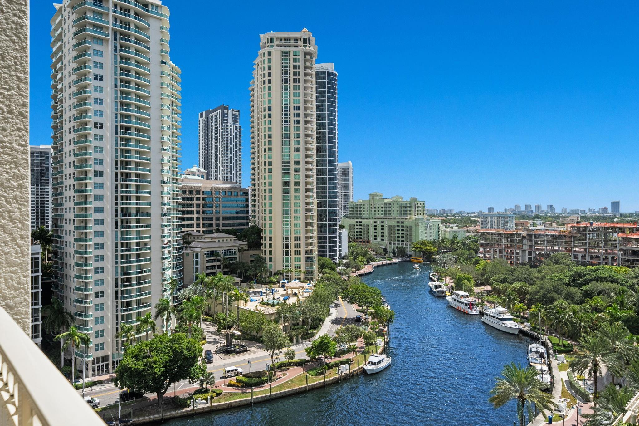 WOW! Waterviews from this pristine Studio right on the River! Bright Sunlit Studio with a terrace made for boat parades! Tile Floor Throughout - continued to the Terrace, updated kitchen with Stainless Appliances, granite countertops and ample cabinet space, Floor to ceiling glass sliders, three closets for storage, upgraded bath with new vanity, glass enclosure and mosaic tiles and Full Size Stackable Washer/Dryer. This unit is all about the VIEW, LOCATION and PRICE! Amenities Include 24 Hr front desk, security, Valet, Roof top Pool, Clubroom, Meditation Garden, BBQ Grills, Hot Tub, Sauna and Steam, Business Center, Fitness Center, Indoor Basketball Court, Spinning Room, Coffee Bar and Racquetball Court. Building has no Assessments, Exterior Just Painted, Great Financials!