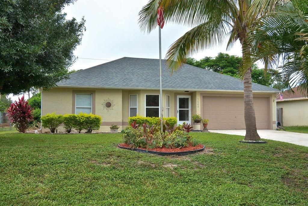 Photo of 3668 SW Dellamano Street, Port Saint Lucie, FL 34953 (MLS # R10748616)