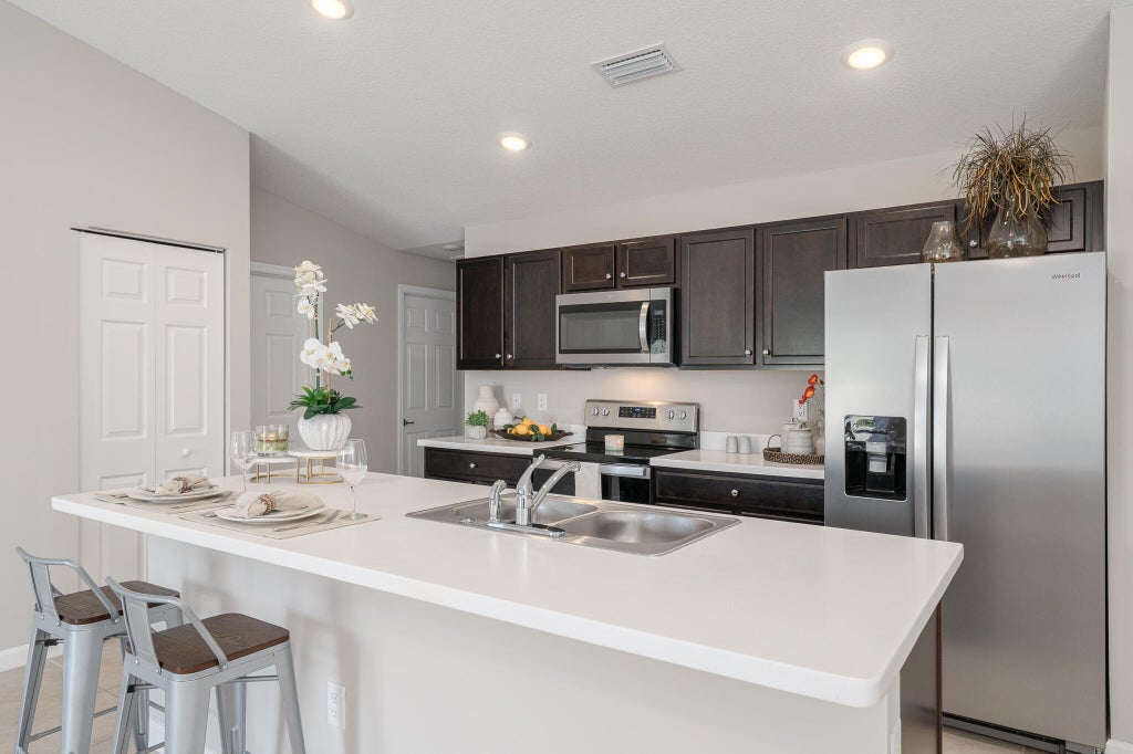 Photo of 3197 SW Armucher Street, Port Saint Lucie, FL 34953 (MLS # R11145542)