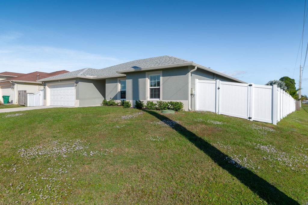 Photo of 3197 SW Armucher Street, Port Saint Lucie, FL 34953 (MLS # R11145542)