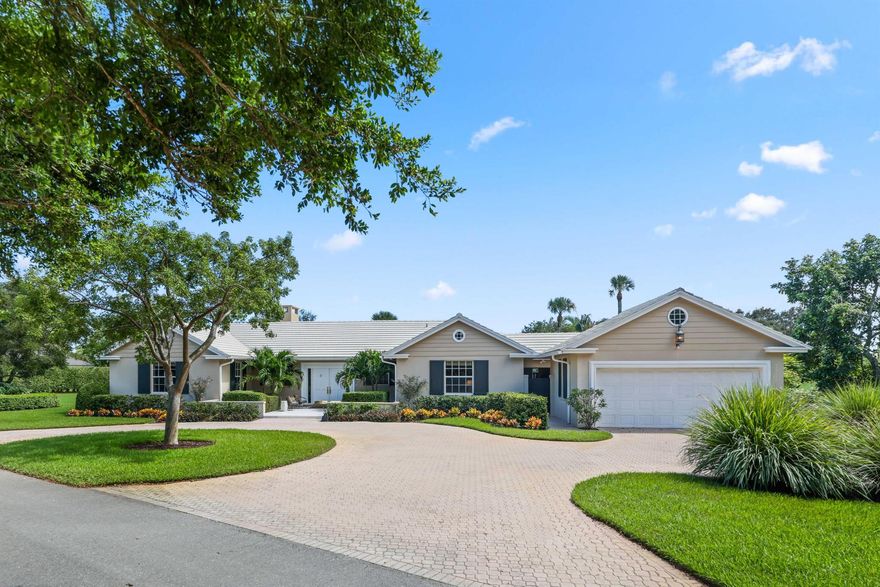 Set on a generous .88-acre lot overlooking the 8th tee, this stately 3-bedroom, 3.2-bath residence with a den offers timeless appeal in the prestigious Village of Golf. Built in 1962 and encompassing 4,215 total square feet (3,671 under air), 36 Country Road exudes warmth, tradition, and understated sophistication. Rich wood floors, cypress wall paneling, and custom millwork set a tone of classic refinement throughout. The formal dining room and spacious living areas offer wonderful entertaining space, while the den with built-in bookshelves provides a quiet retreat for work or relaxation. The kitchen, finished with classic wood cabinetry, granite countertops, and newer appliances, balances traditional style with modern function. Complete with impact glass windows, approx. 6-year-old roof