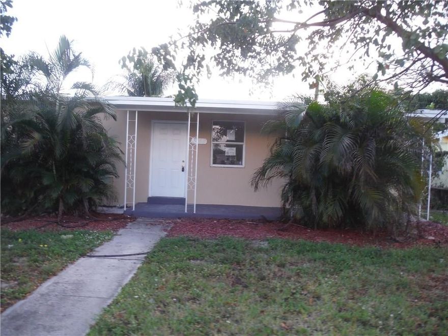 WOW!! FABULOUS TOTALY REMODELED 3 BEDROOM 1 BATH HOME WITH NEW ROOF, KITCHEN, HURRICANE SHUTTERS, NEW A/C, WATERHEATER, UPGRADED ELECTRIC PANEL, LAUNDRY ROOM, FENCED YARD AND NEW PLUMBING. ALL WORK DONE WITH PERMITS. THIS HOME IS READY TO MOVE INTO!!