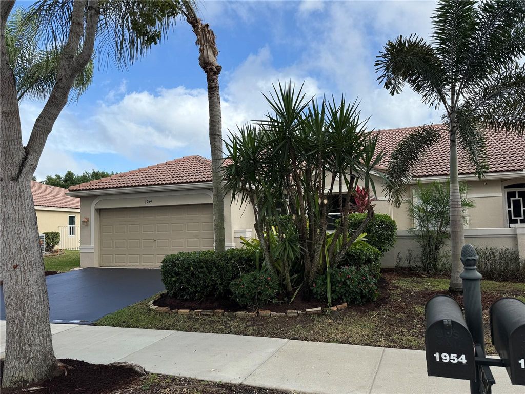 Photo of 1954 Andromeda Ln, Weston, FL 33327 (MLS # F10533701)