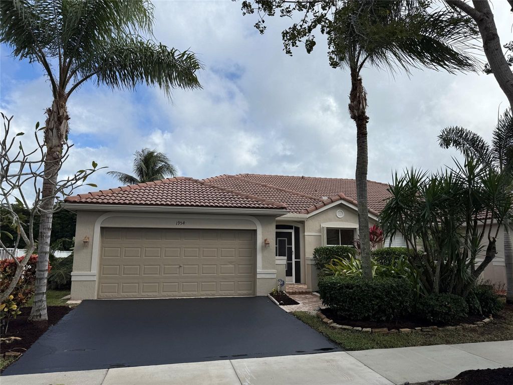 Photo of 1954 Andromeda Ln, Weston, FL 33327 (MLS # F10533701)