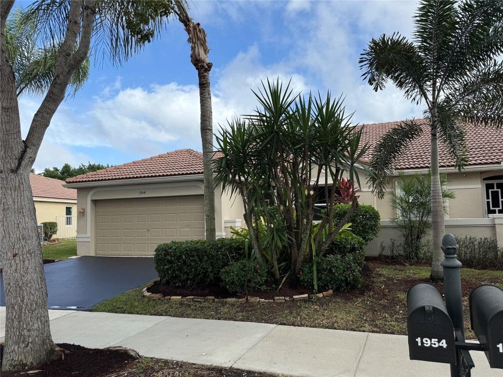 Photo of 1954 Andromeda Lane, Weston, FL 33327 (MLS # F10533701)