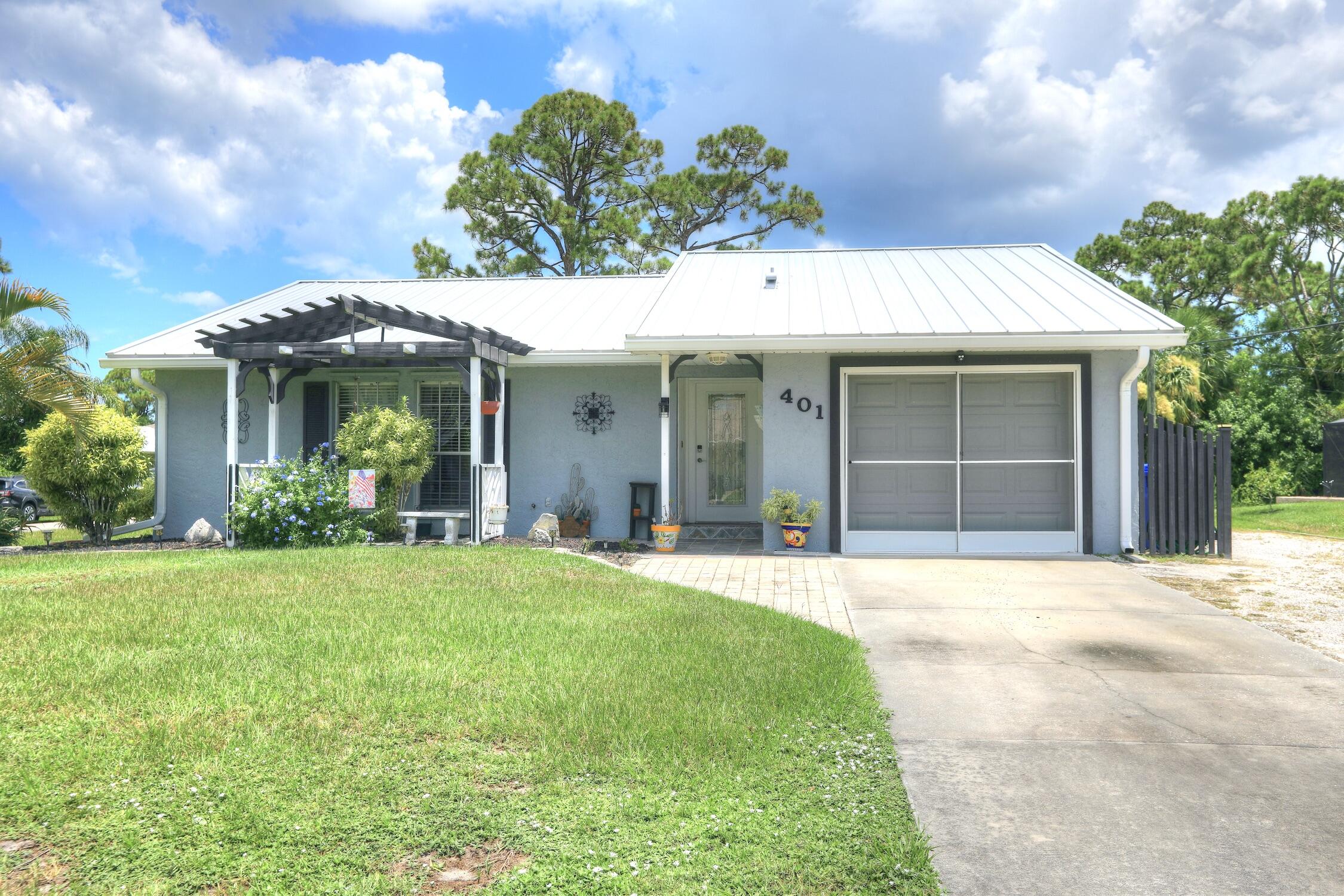 This charming 3 bedroom, 2 bath concrete block home on a corner lot boasts great curb appeal and tropical landscaping located in the heart of the Sebastian Highlands with no HOA! Home features a spacious 1 car garage, gally kitchen, large screened porch, extended outdoor paver patio leading to a large workshop that could easily be converted to additional living space. Plenty of room for RV/boat parking. Close to river, beaches and the best Sebastian has to offer!