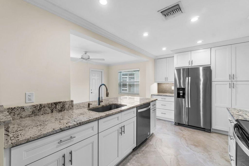 Photo of 2096 SW 13th Terrace, Boynton Beach, FL 33426 (MLS # R11156254)