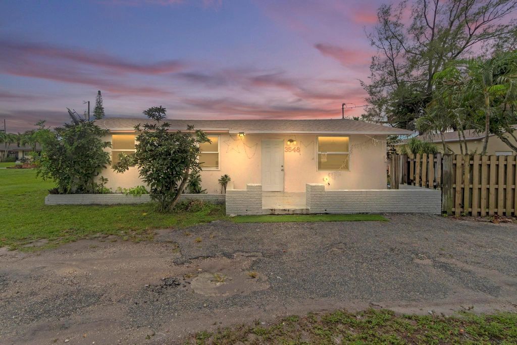 Photo of 3548 Melaleuca Lane, Lake Worth, FL 33461 (MLS # F10515985)