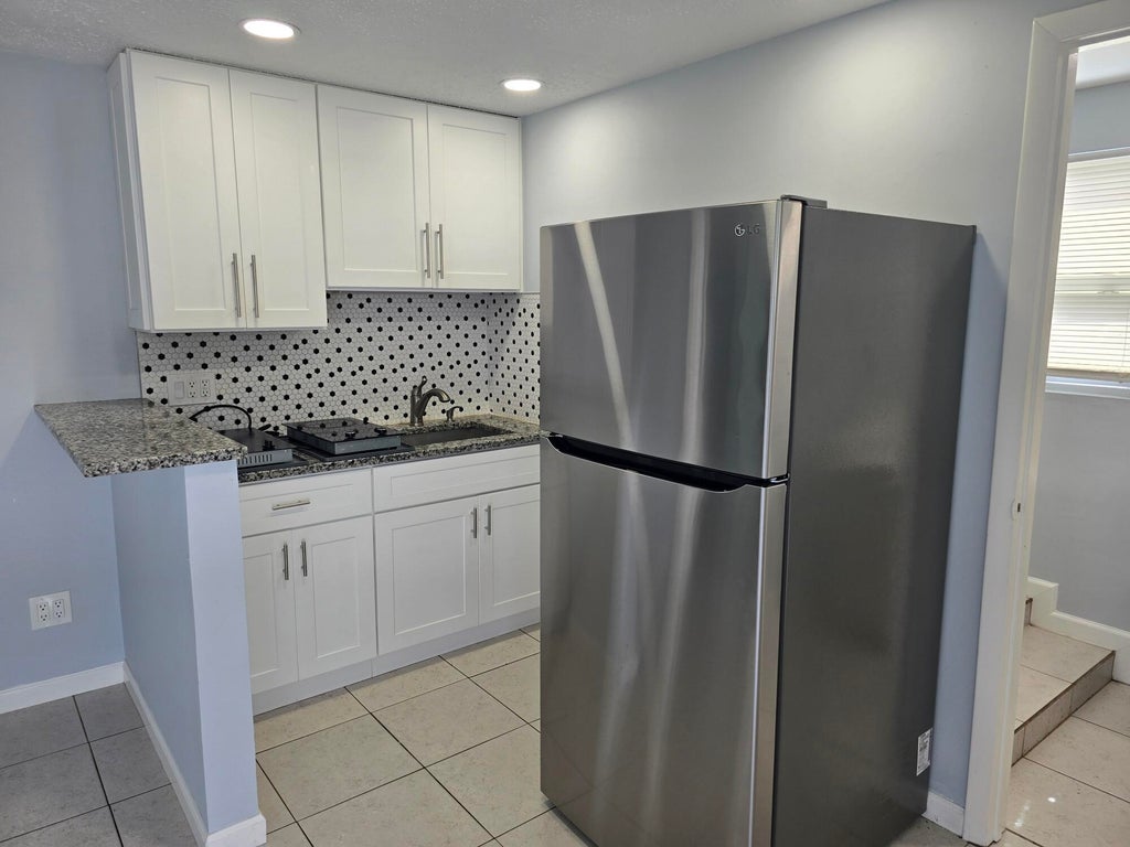 Photo of 513 Greynolds Circle #Cottage, Lantana, FL 33462 (MLS # R11110324)