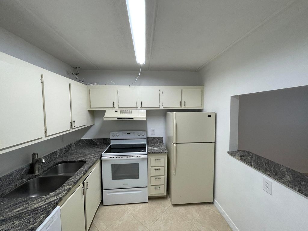 Photo of 2100 Springdale Boulevard #209, Palm Springs, FL 33461 (MLS # R11168196)