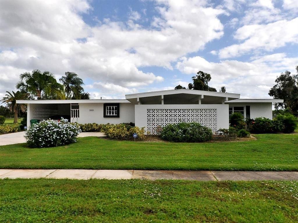 Photo of 3003 SE Santa Anita Street, Port St Lucie, FL 34952 (MLS # R10888153)