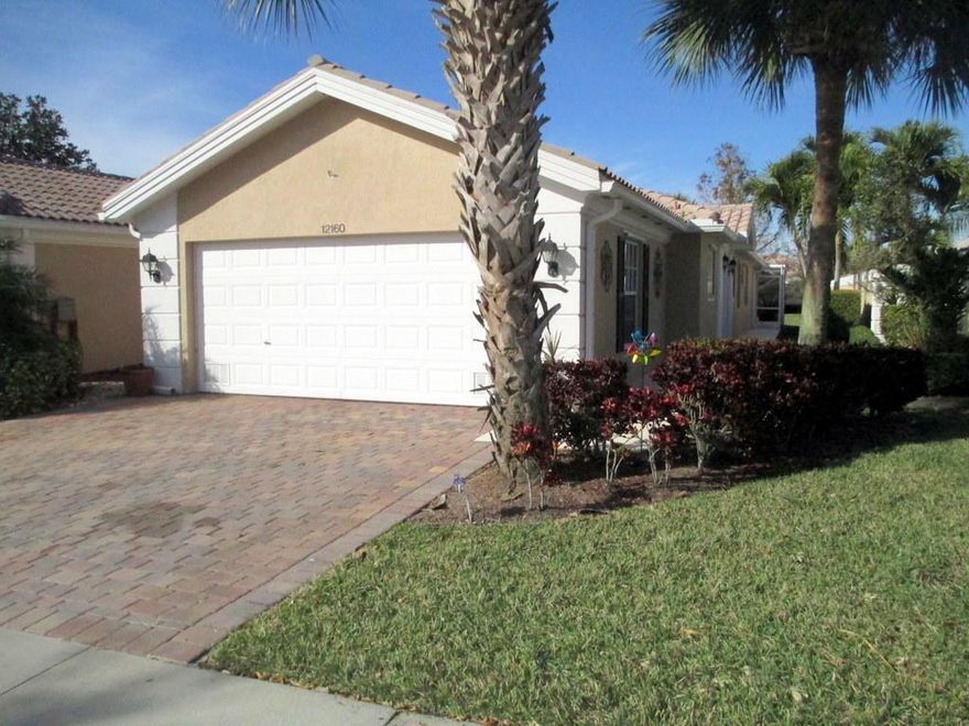 Waterfront Lot - Immaculate Capri Model, with extended Great Room, (2) Bedrooms, (2) Baths, tiled floors, Living Center Kitchen, Corian Tops, HOA fees include basic cable, high-speed internet, security alarm system monitoring, lawn maintenance.  Community amenities: 24-hour manned gate, 2 geo-thermal Heated Pools, Tennis, and Exercise Facilities.