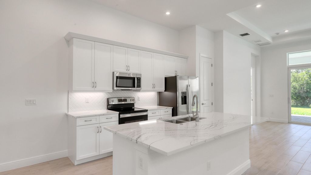 Photo of 175 SE Via Sangro, Port Saint Lucie, FL 34952 (MLS # R10960519)