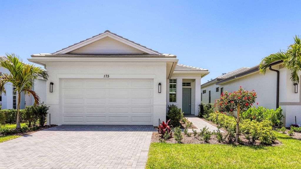 Photo of 175 SE Via Sangro, Port Saint Lucie, FL 34952 (MLS # R10960519)