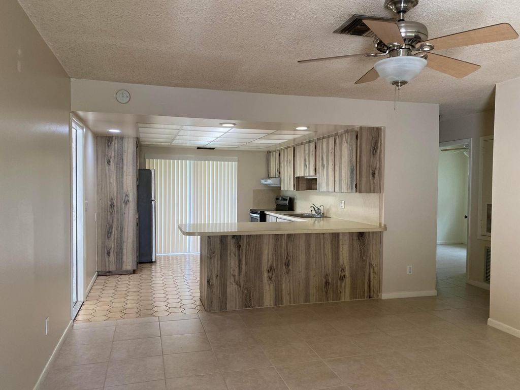 Photo of 1367 Sunset Road, Palm Springs, FL 33406 (MLS # R10987724)