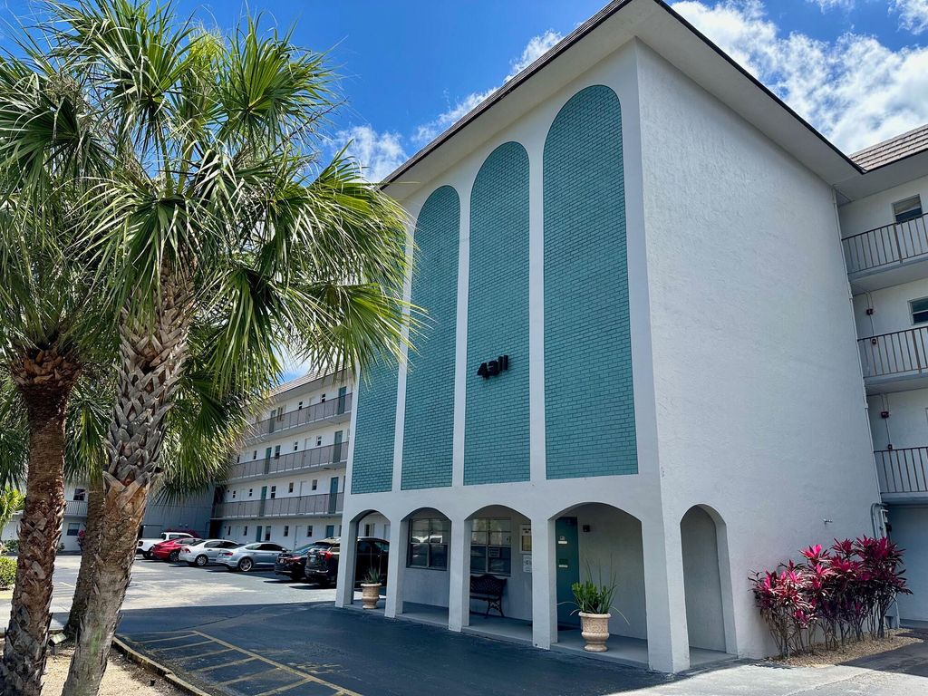 Photo of 4311 Crystal Lake Drive #407, Deerfield Beach, FL 33064 (MLS # B26017616)