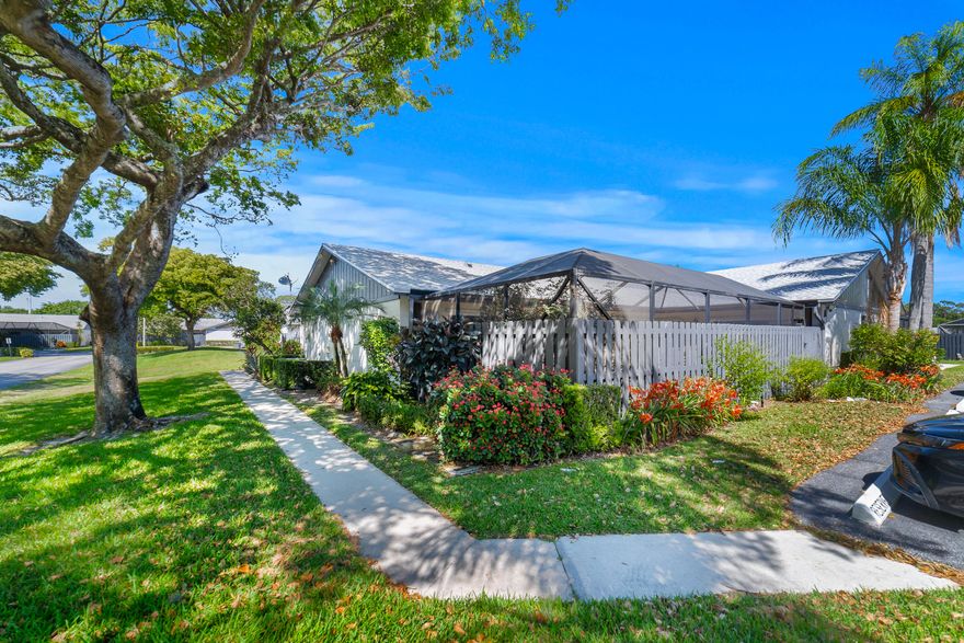 Discover this spacious, well maintained 3-bedroom, 2-bathroom villa in the sought-after community of Summit Pines with a BRAND NEW ROOF (2025)! The home features a comprehensive impact-rated system protects the villa's windows and two sliding glass doors, offering added security and storm resilience, a bright and airy open floor plan with vaulted ceilings and sleek tile and laminate flooring throughout. The updated kitchen is equipped with newer stainless steel appliances and ample cabinetry. The spacious primary suite offers a private en-suite bath and generous closet space. Head outside to a tranquil, screened-in patio, ideal for unwinding or hosting guests. The unit comes with TWO parking spaces. Newer leased HVAC and water heater systems offer maintenance-free convenience, with all service and repairs included and no rate increases. This pet-friendly community offers fantastic amenities, including a pool, clubhouse, playground, and walking trails. Conveniently located near shopping, dining, and major highways, this move-in-ready home is one you won't want to miss!