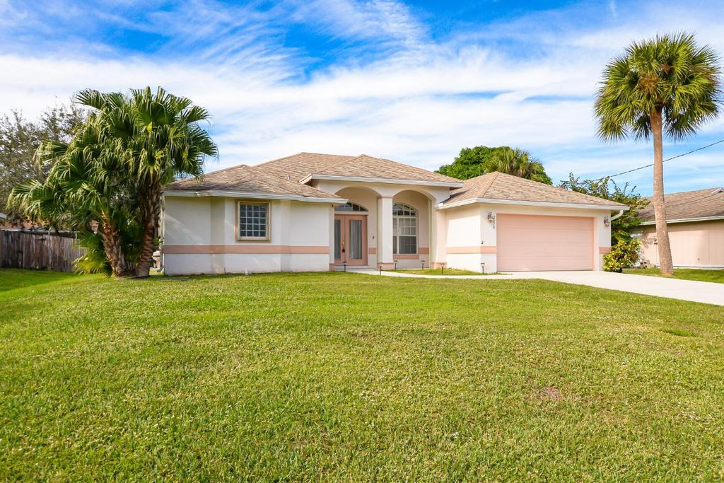 Photo of 2270 SW Tampico Street, Port Saint Lucie, FL 34953 (MLS # R10943555)