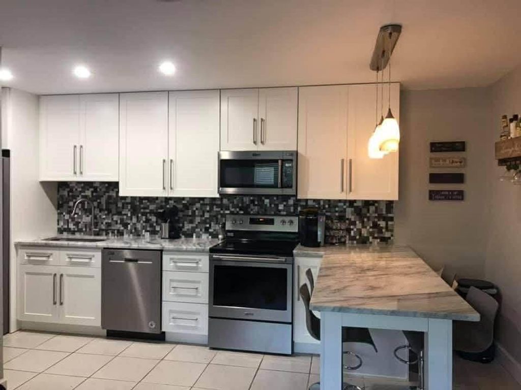 Photo of 3211 SW 44th Street #215, Dania Beach, FL 33312 (MLS # B26015601)