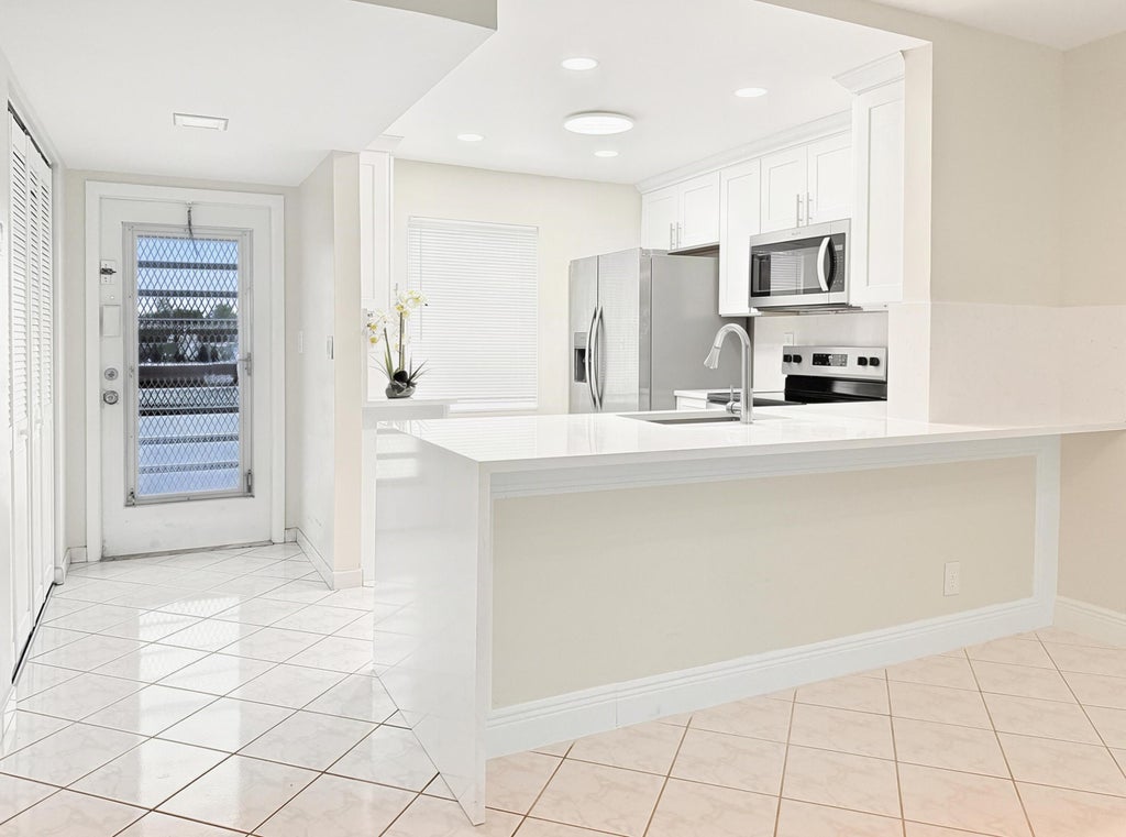 Photo of 9272 SW 3RD Street #404, Boca Raton, FL 33428 (MLS # B26069399)